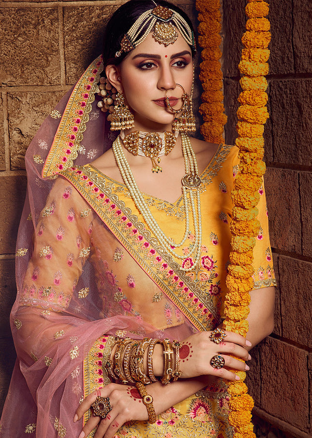 Yellow and Pink Heavy Embroidered Lehenga