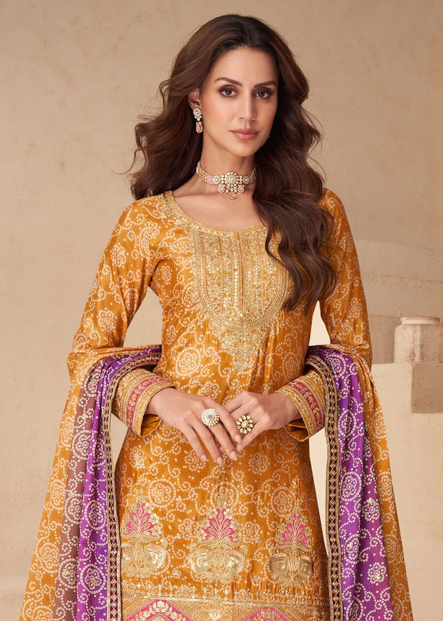Mustard Yellow and Purple Printed and Embroidered Sharara Suit