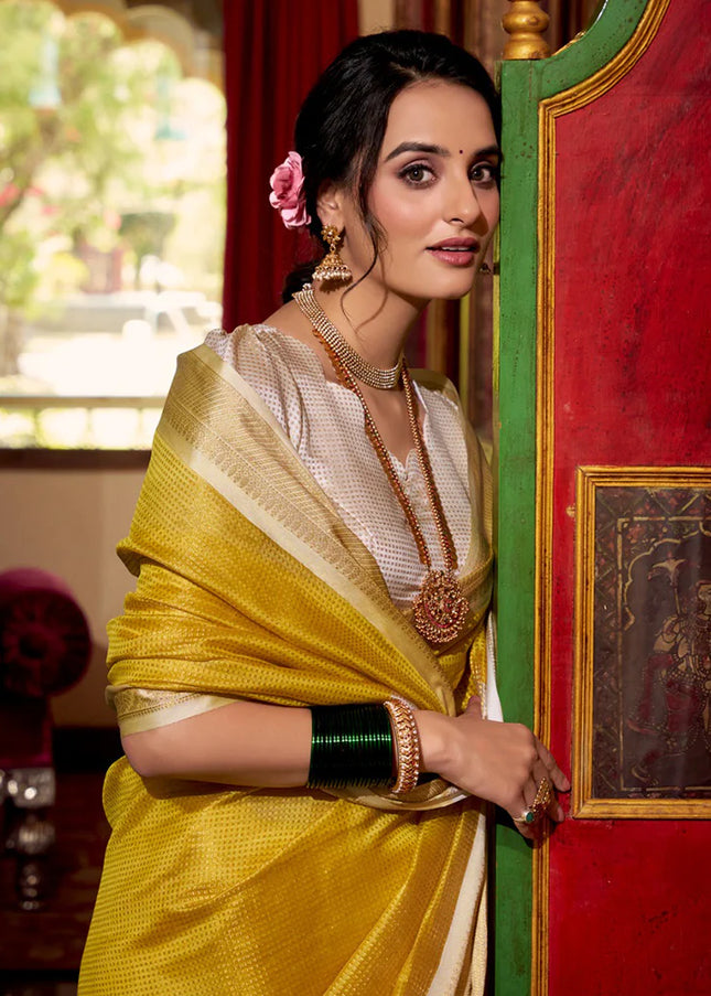 Yellow and Offwhite Embroidered  Saree
