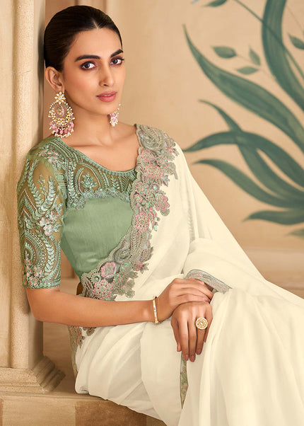 Offwhite and Sea Green Embroidered Saree