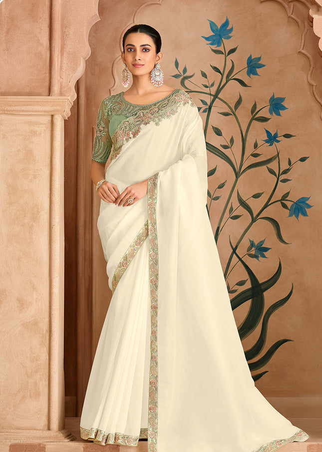 Offwhite and Sea Green Embroidered Saree