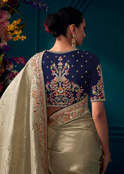 Beige and Violet Embroidered Wedding Saree