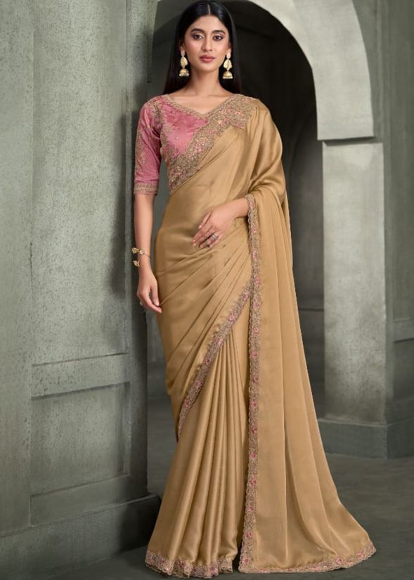 Beige and Pink Embroidered Saree