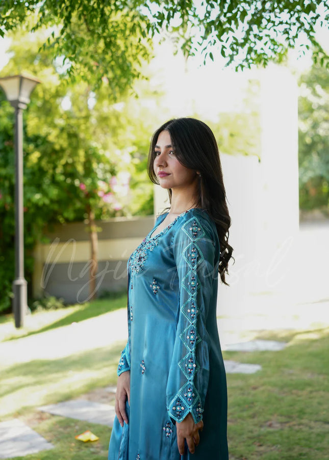 Najia Faisal | Cyan
