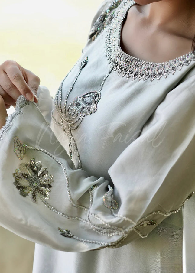 Najia Faisal | Rhea