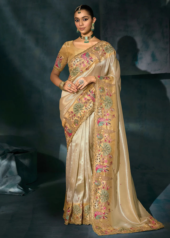 Cream and Beige Embroidered Saree