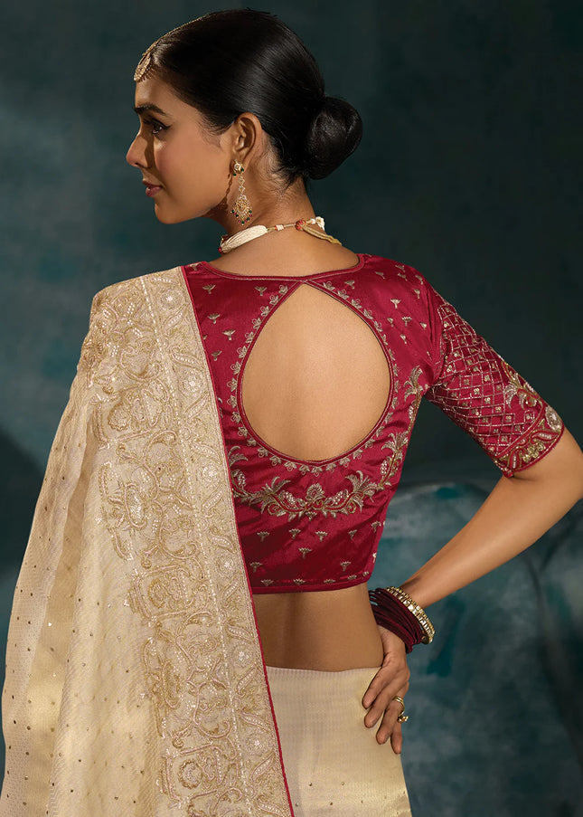 Cream and Maroon Embroidered Saree