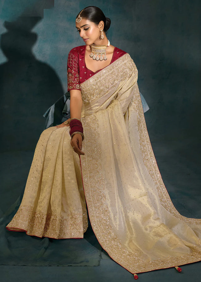 Cream and Maroon Embroidered Saree