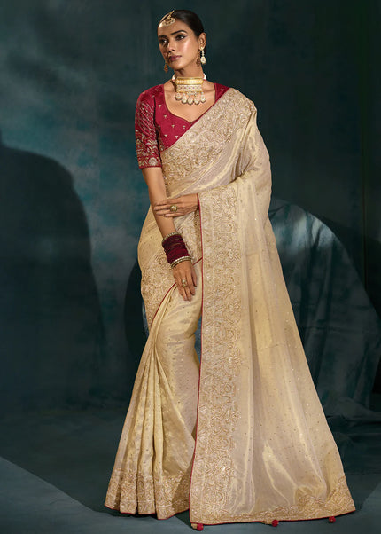 Cream and Maroon Embroidered Saree