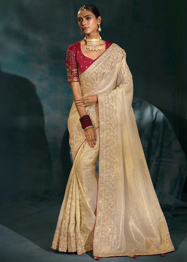 Cream and Maroon Embroidered Saree