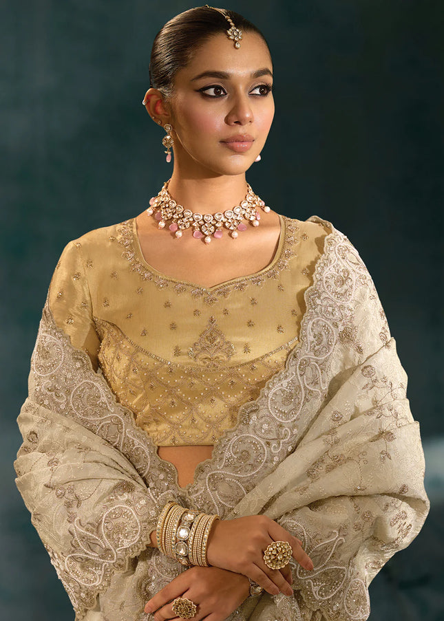 Cream and Gold Embroidered Saree