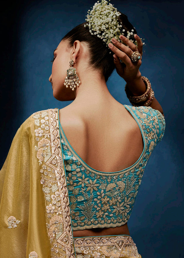 Mustard Yelllow and Teal Embroidered Festive Saree