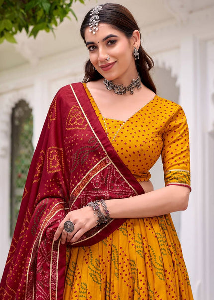 Yellow and Maroon Printed and Embroidered Lehenga Choli