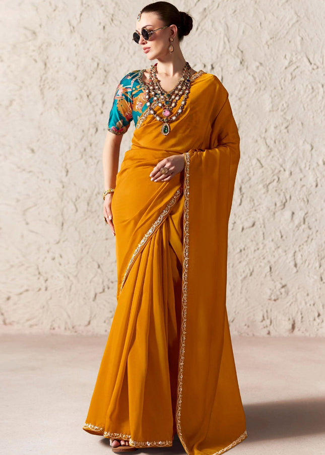 Orange Printed and Embroidered Festive Saree