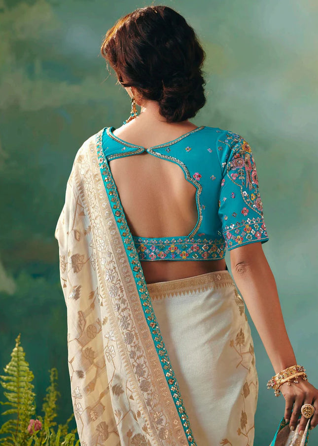 Cream and Blue Embroidered Wedding Saree