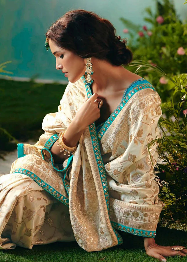Cream and Blue Embroidered Wedding Saree
