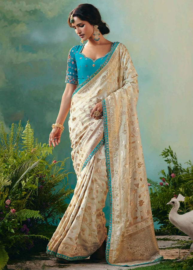 Cream and Blue Embroidered Wedding Saree