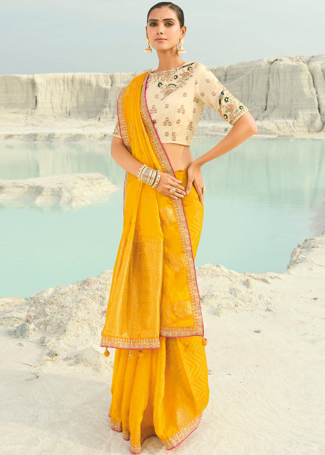 Cream and Yellow Embroidered Saree