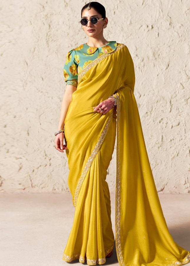 Yellow and Sea Green Printed and Embroidered Festive Saree