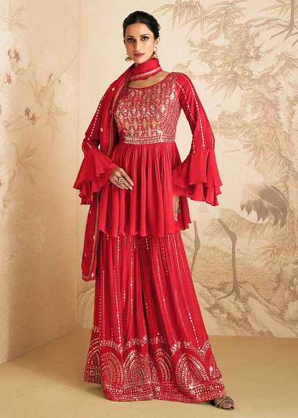Reddish Pink and Gold Embroidered Sharara Suit