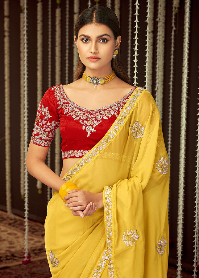 Yellow and Red Embroidered Saree