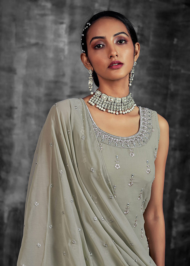 Pista and Gold Embroidered Sharara Suit